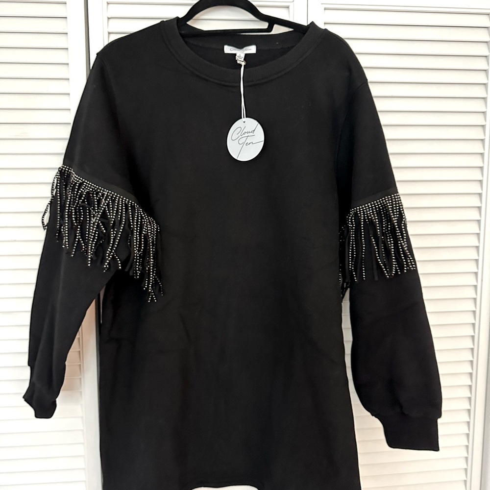 This has never been worn size large brand is Cloud Ten.